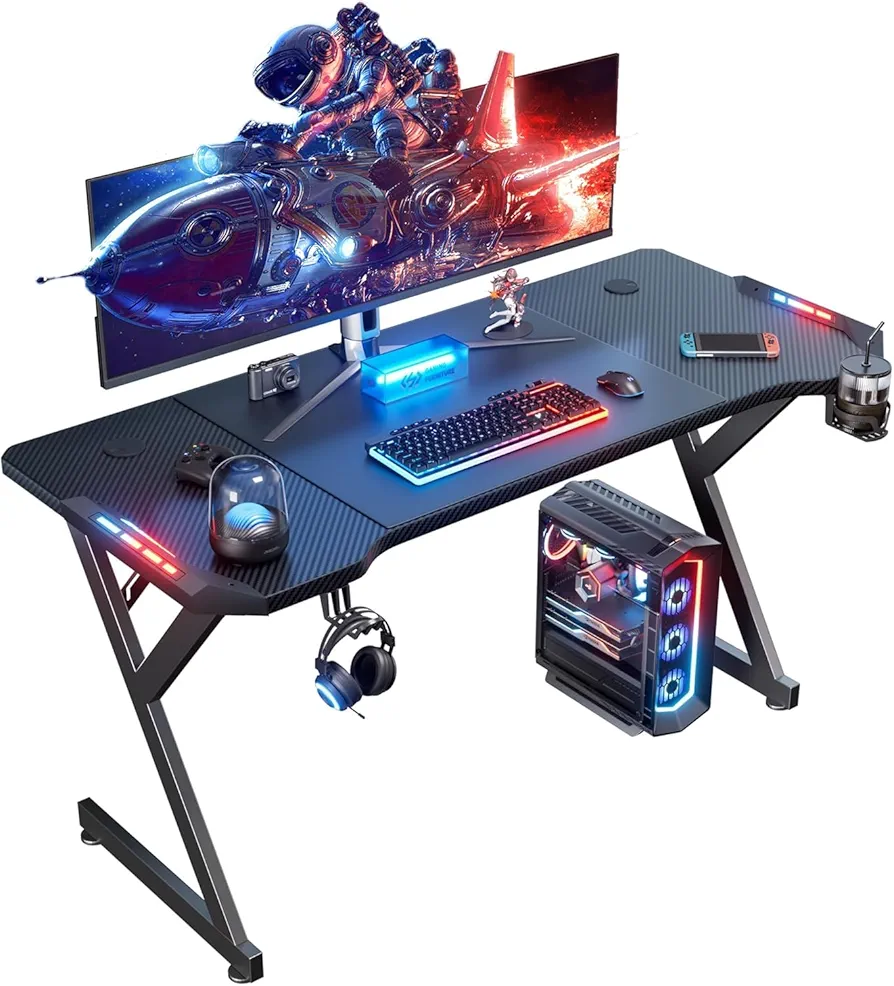 HLDIRECT 55 Inch Gaming Desk with LED Lights, Ergonomic Computer Gaming Table with Carbon Fibre Surface, Sturdy PC Workstation Desk for Gaming and Home Office with Headphone Hook, Cup Holder, Black